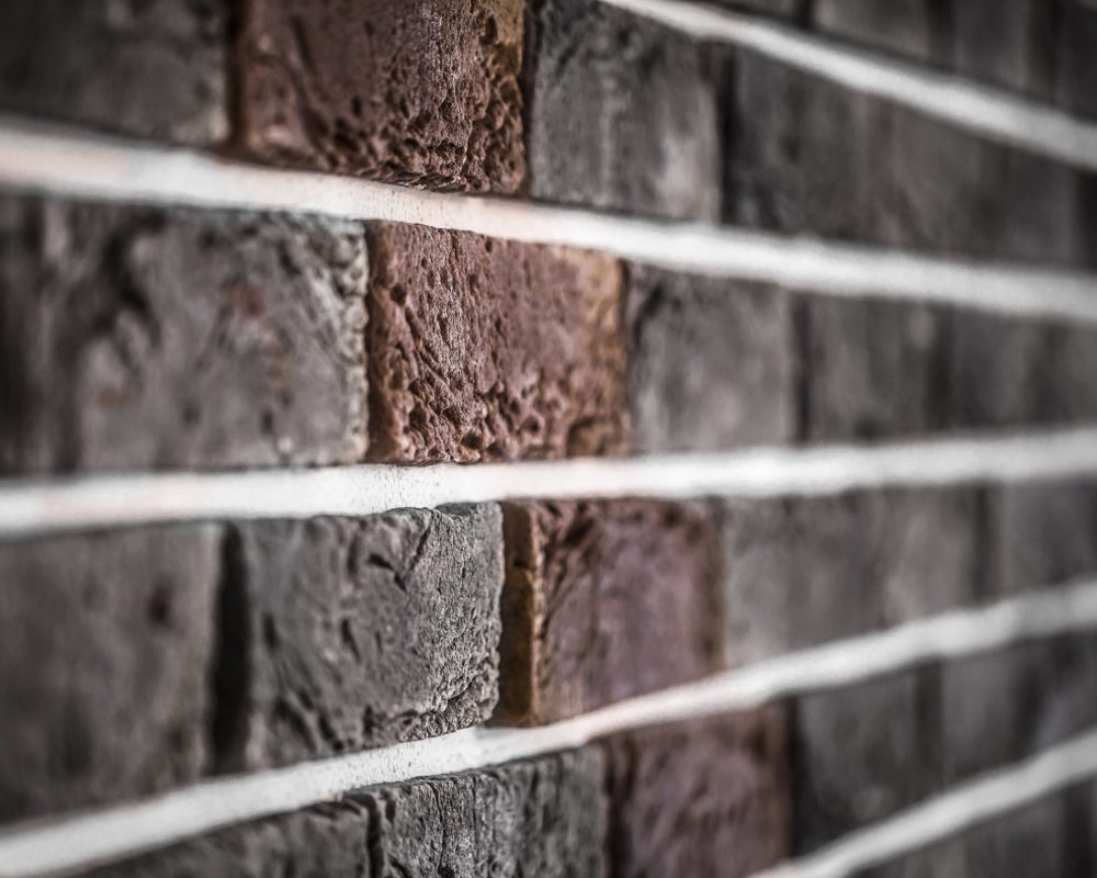 Beautiful brick wall, dark brown closeup ,background